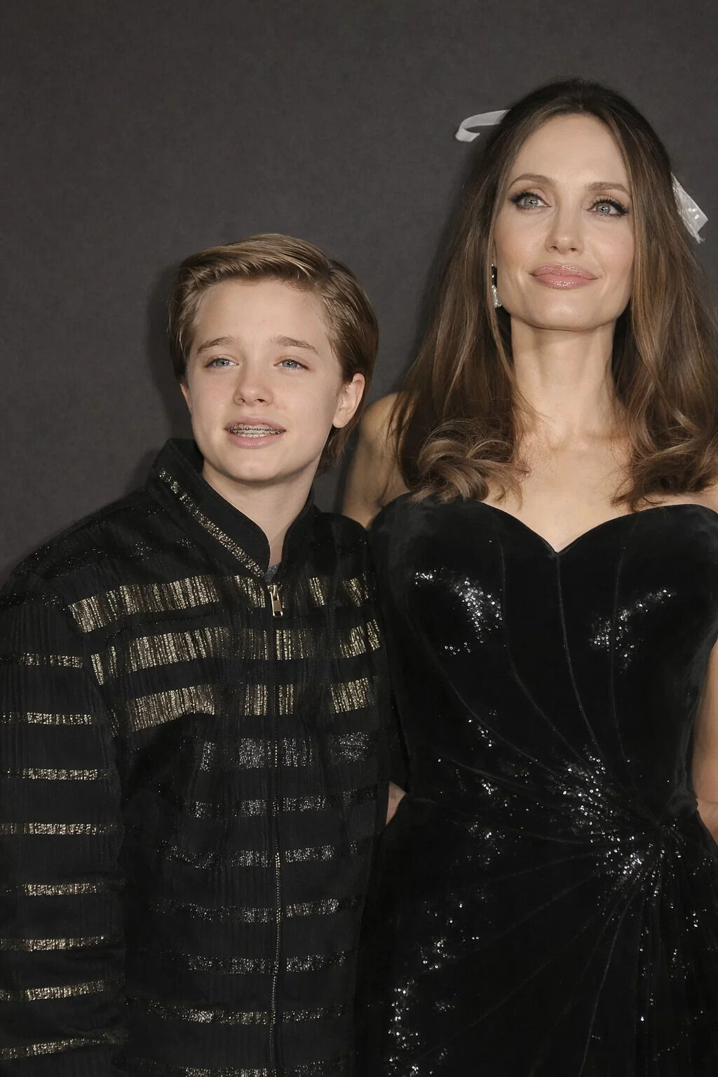 Shiloh Jolie-Pitt Celebrates 16th Birthday, Showcasing a Stunning Evolution in Style and Confidence Over the Years, From Androgynous, Relaxed Early Looks to Polished, Contemporary Fashion Choices, Reflecting Personal Growth, Individuality, and Self-Assurance While Navigating Adolescence under Public Scrutiny, Demonstrating the Power of Authenticity, Family Support, and Self-Discovery Amid Fame